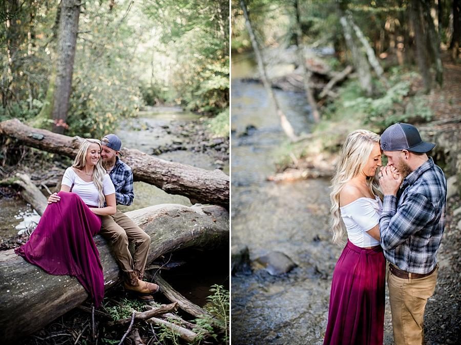 Standing in creek smiling at this Townsend Anniversary session by Knoxville Wedding Photographer, Amanda May Photos.