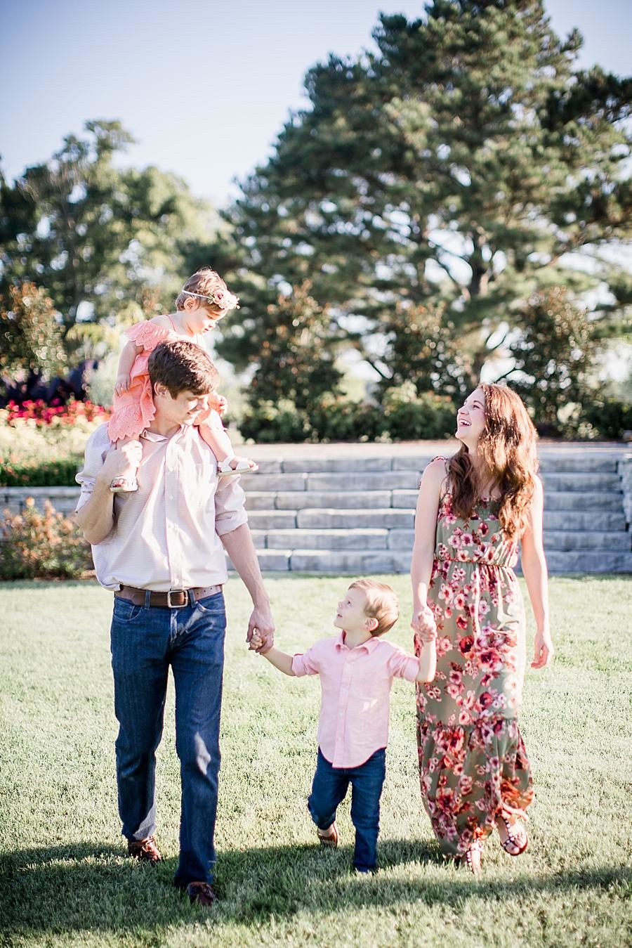 Holding hands at this Shelby Bottoms Park family session by Knoxville Wedding Photographer, Amanda May Photos.