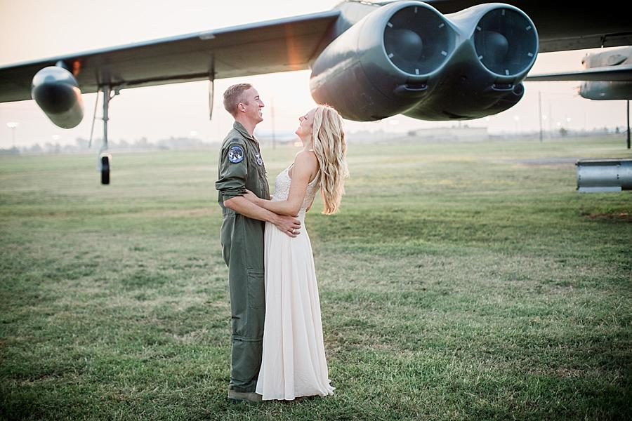 Sunrise by the plane at this Air Force Engagement Session by Knoxville Wedding Photographer, Amanda May Photos.