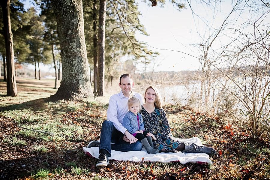 Sitting on a blanket at this concord park family session by Knoxville Wedding Photographer, Amanda May Photos.