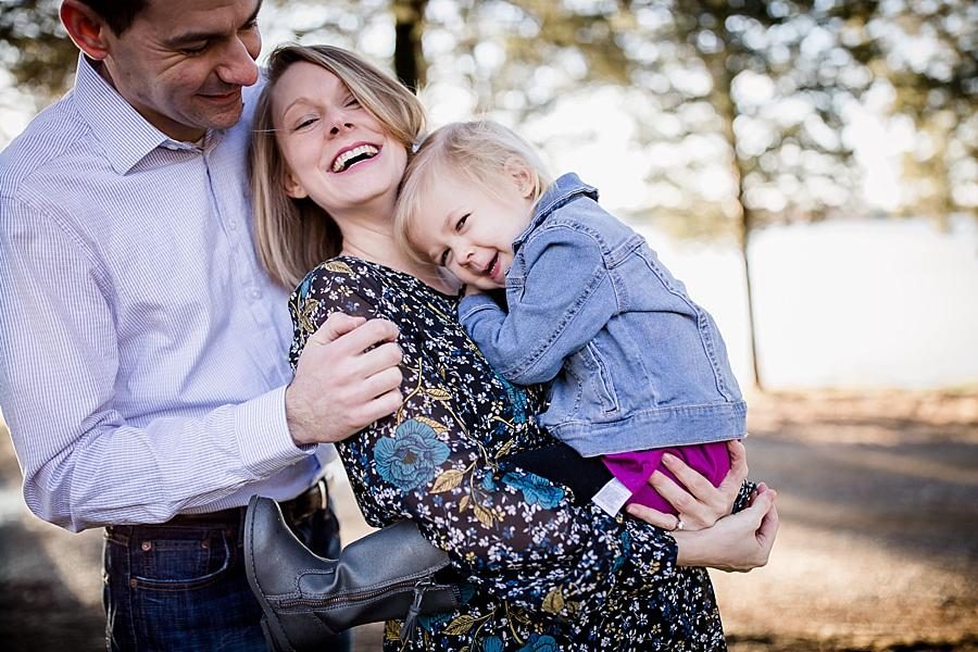 Laughing together at this concord park family session by Knoxville Wedding Photographer, Amanda May Photos.