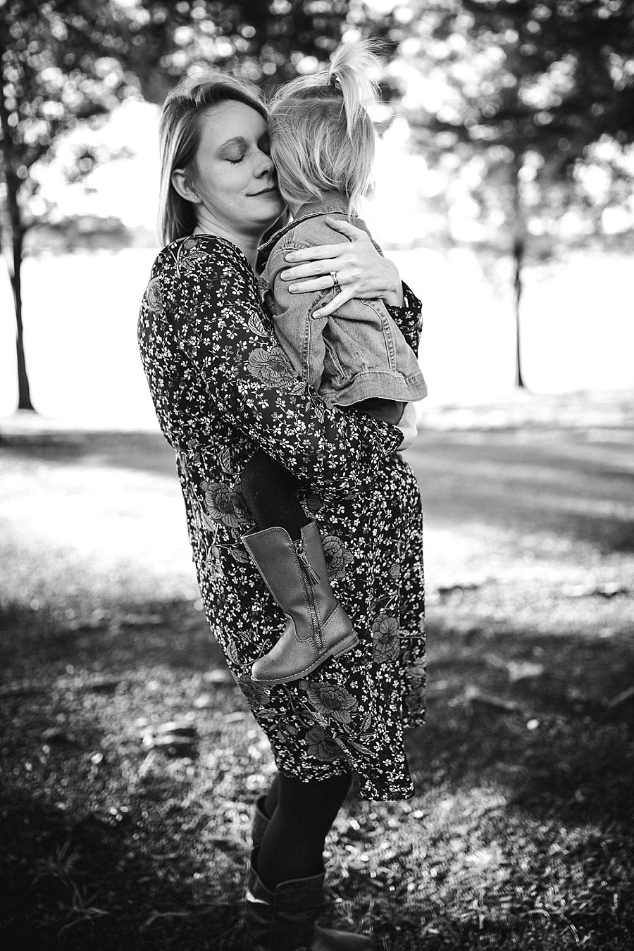 Black and white snuggles at this concord park family session by Knoxville Wedding Photographer, Amanda May Photos.