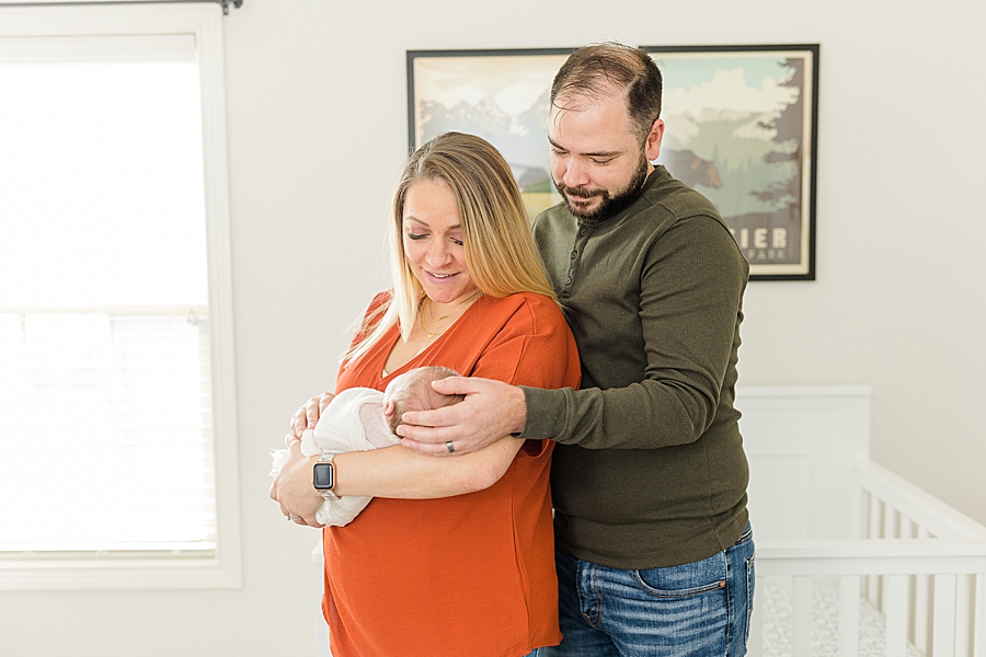 parents holding son at this newborn session