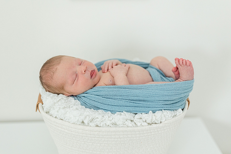 blue baby swaddle at this newborn session