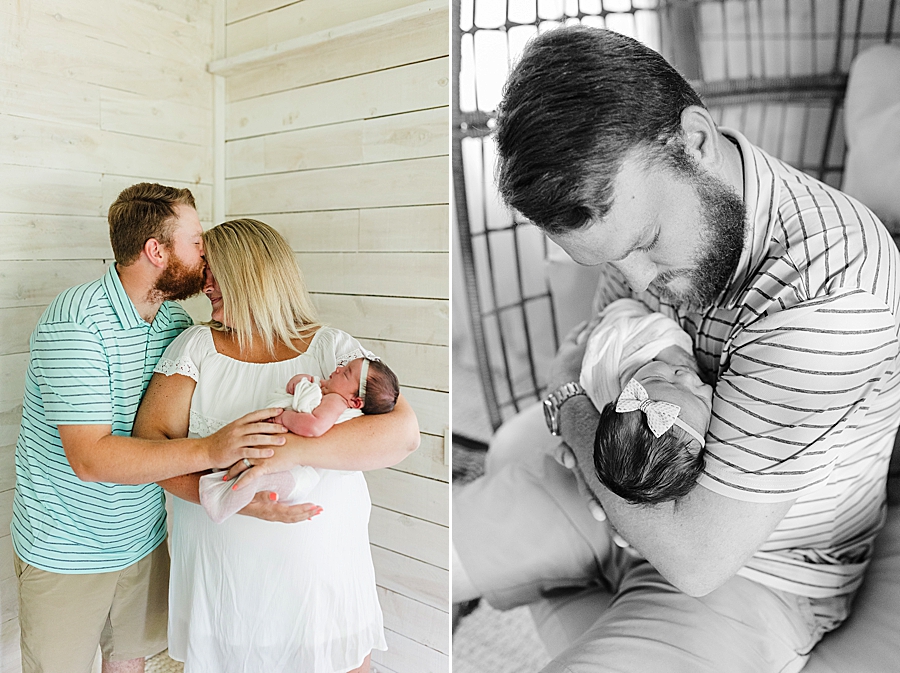 dad holding daughter at this newborn session