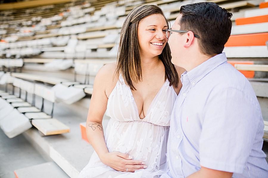 Stadium seating at this Neyland Stadium maternity session by Knoxville Wedding Photographer, Amanda May Photos.