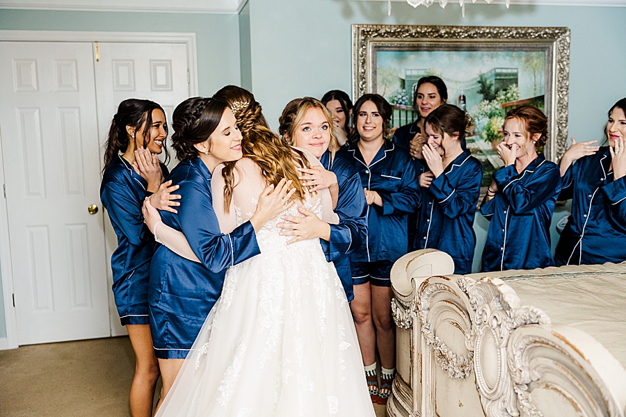 Bridesmaids’ first look at rain castleton wedding