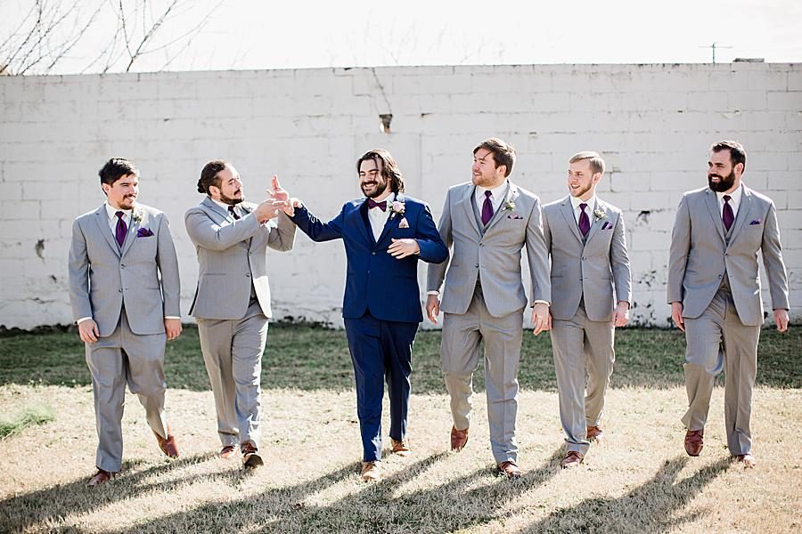 High fives at this Relix Theater Wedding by Knoxville Wedding Photographer, Amanda May Photos.