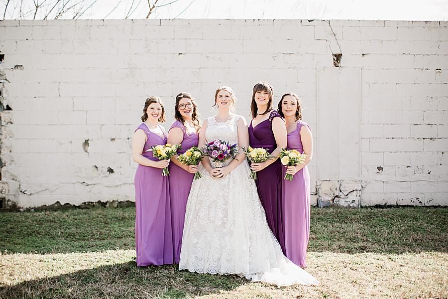 Purple dresses at this Relix Theater Wedding by Knoxville Wedding Photographer, Amanda May Photos.