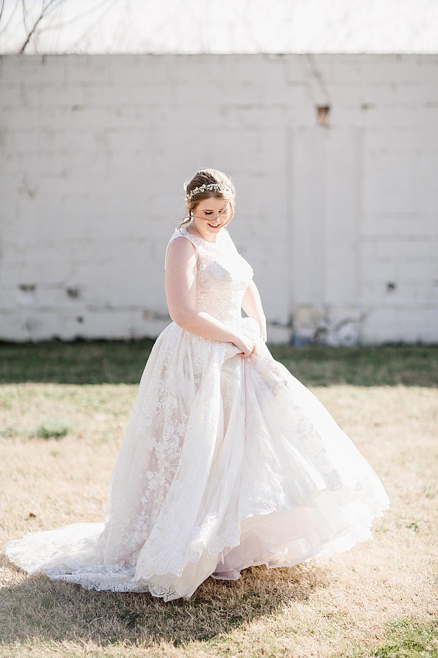 Twirling dress at this Relix Theater Wedding by Knoxville Wedding Photographer, Amanda May Photos.