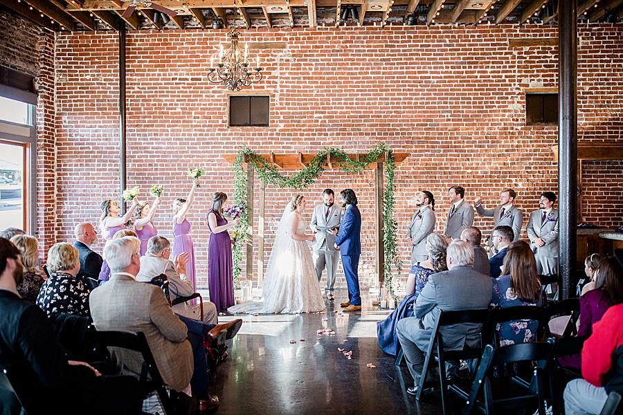 Exchanging vows at this Relix Theater Wedding by Knoxville Wedding Photographer, Amanda May Photos.