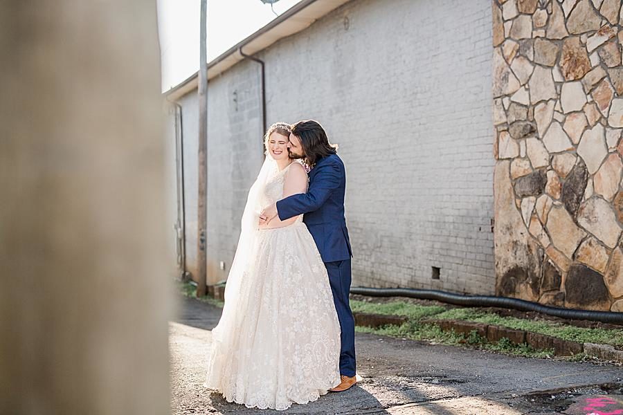 Nuzzling at this Relix Theater Wedding by Knoxville Wedding Photographer, Amanda May Photos.