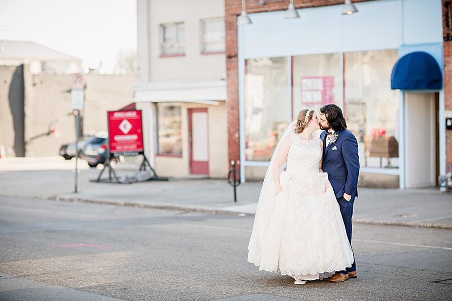Kisses at this Relix Theater Wedding by Knoxville Wedding Photographer, Amanda May Photos.