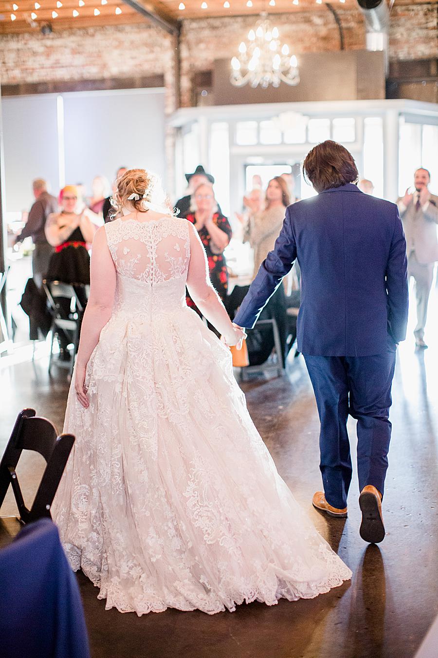 Entering reception at this Relix Theater Wedding by Knoxville Wedding Photographer, Amanda May Photos.