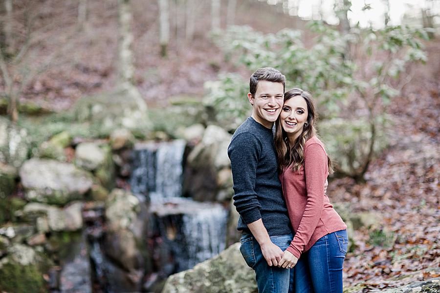 Waterfall background at this Smoky Mountain Engagement by Knoxville Wedding Photographer, Amanda May Photos.