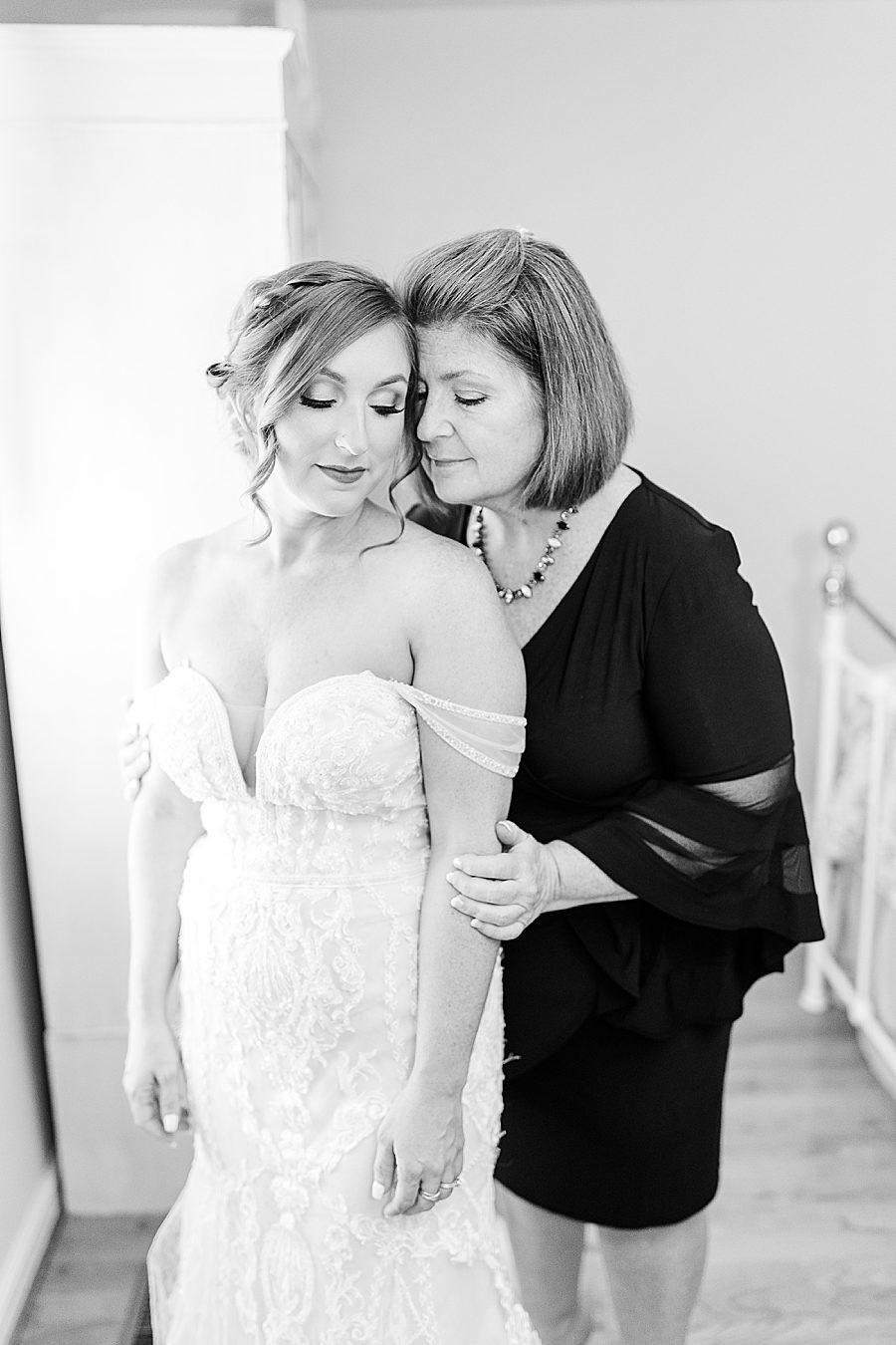 bride and mother of the bride at this stone gate farm wedding
