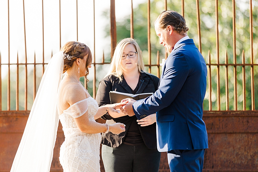 exchanging rings at this stone gate farm wedding