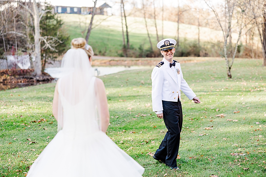 groom seeing bride during first look at this strawberry creek wedding