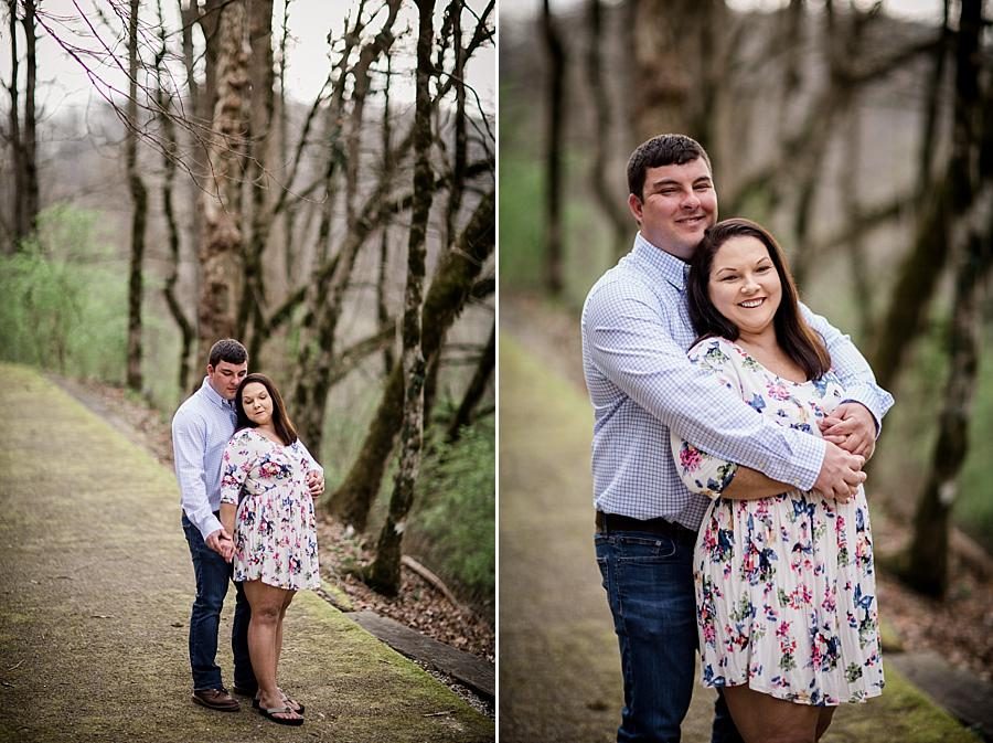 Hug from behind at this Norris Dam Engagement Photos by Knoxville Wedding Photographer, Amanda May Photos.
