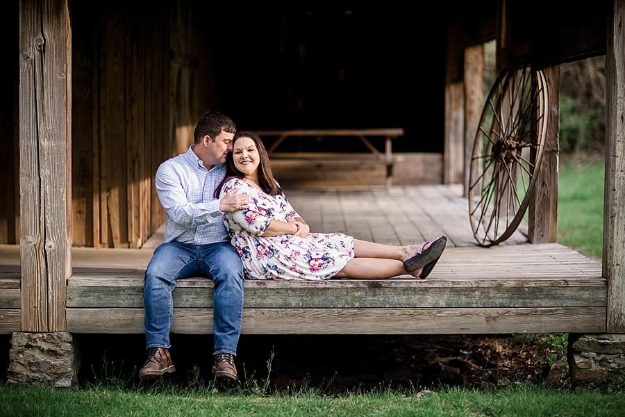 Sitting down at this Norris Dam Engagement Photos by Knoxville Wedding Photographer, Amanda May Photos.