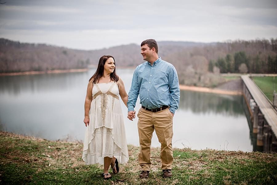 By the lake at this Norris Dam Engagement Photos by Knoxville Wedding Photographer, Amanda May Photos.