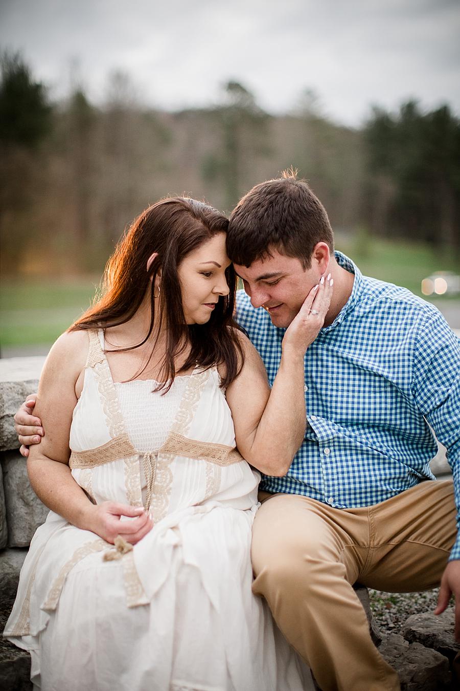 Hand on cheek at this Norris Dam Engagement Photos by Knoxville Wedding Photographer, Amanda May Photos.