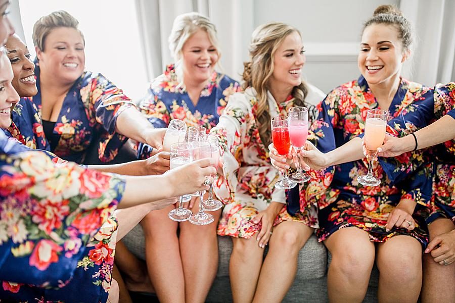 Bridesmaids in matching robes at this The Olmsted Wedding by Knoxville Wedding Photographer, Amanda May Photos.