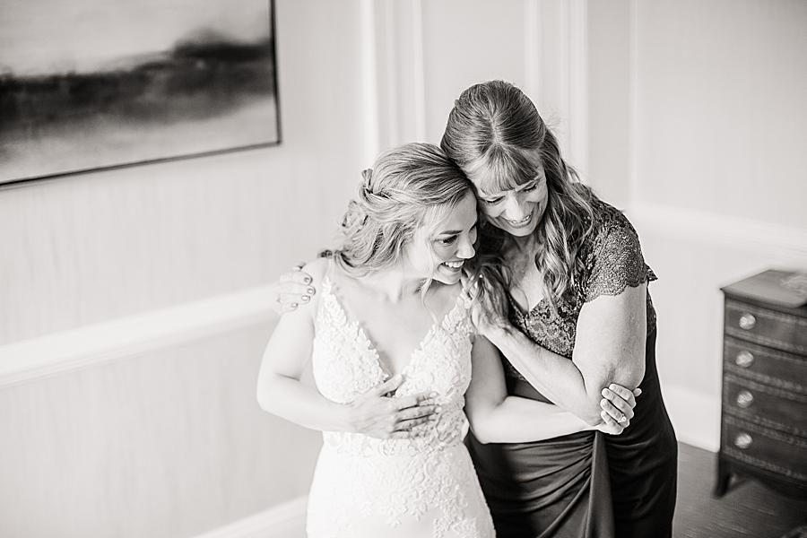 Mother hugging daughter by Knoxville Wedding Photographer, Amanda May Photos.