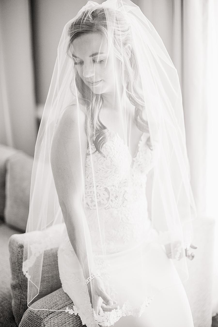 Bride under blusher veil at this The Olmsted Wedding by Knoxville Wedding Photographer, Amanda May Photos.