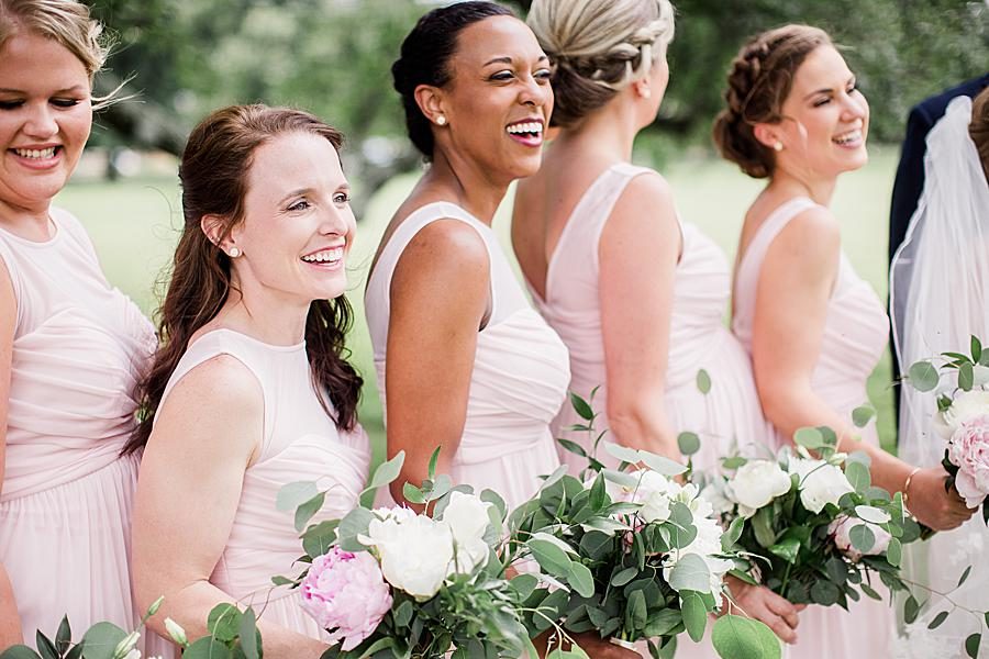 Bridesmaids laughing by Knoxville Wedding Photographer, Amanda May Photos.