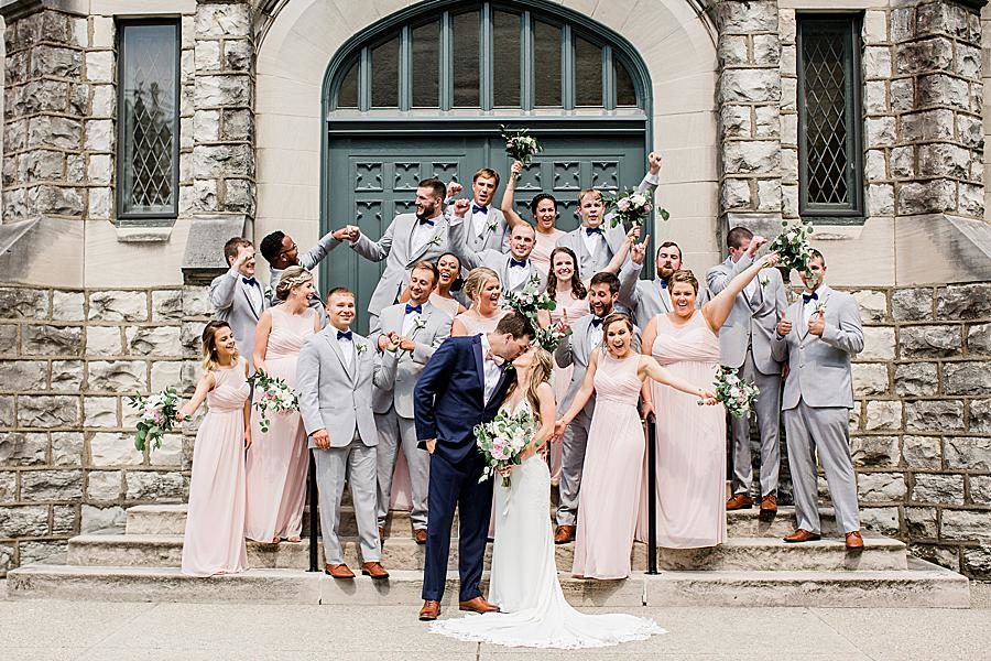 Wedding party celebrating bride and groom at this The Olmsted Wedding by Knoxville Wedding Photographer, Amanda May Photos.