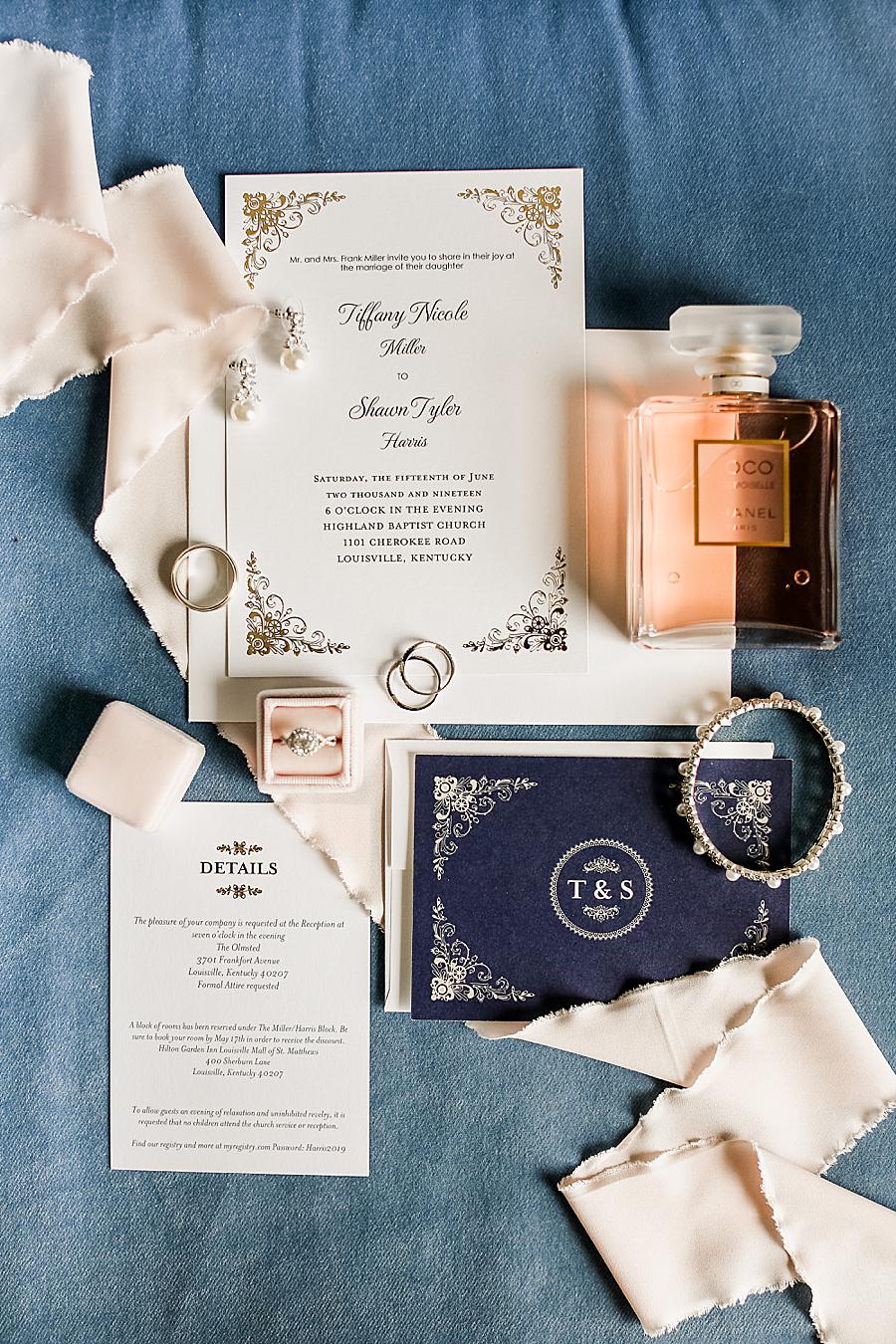 Invitation suite flat lay at this The Olmsted Wedding by Knoxville Wedding Photographer, Amanda May Photos.