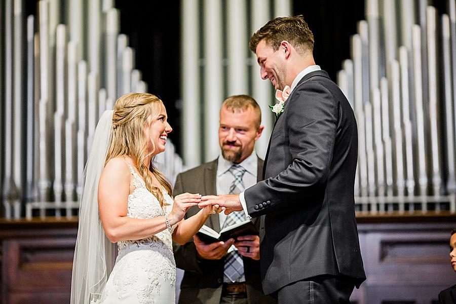 Exchanging rings at this The Olmsted Wedding by Knoxville Wedding Photographer, Amanda May Photos.