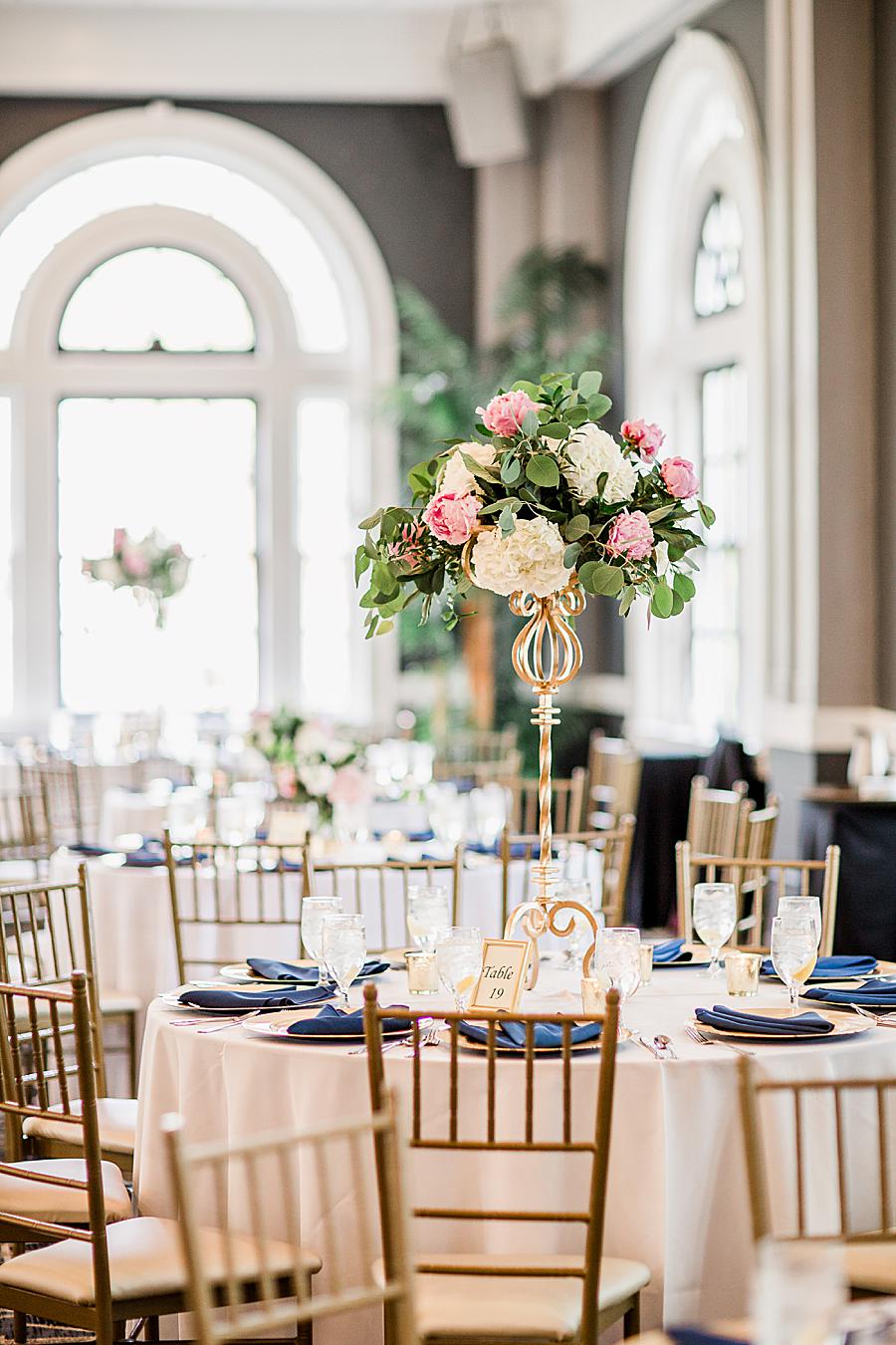 Tall floral centerpieces at this The Olmsted Wedding by Knoxville Wedding Photographer, Amanda May Photos.