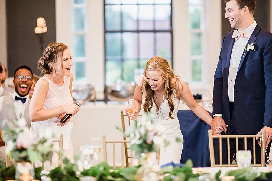 Belly laughing by Knoxville Wedding Photographer, Amanda May Photos.
