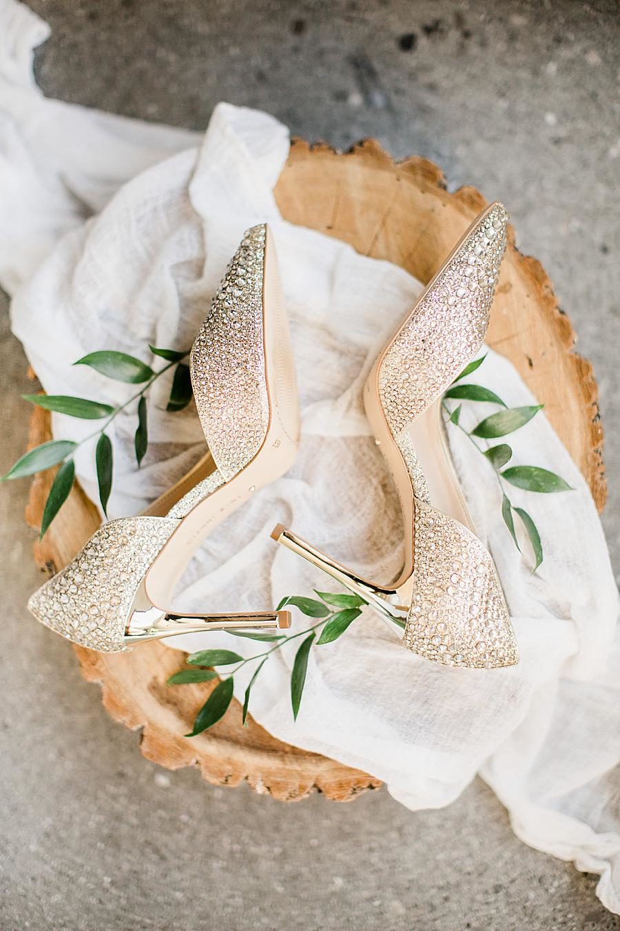 Crystal crusted wedding shoes at this The Press Room Wedding by Knoxville Wedding Photographer, Amanda May Photos.