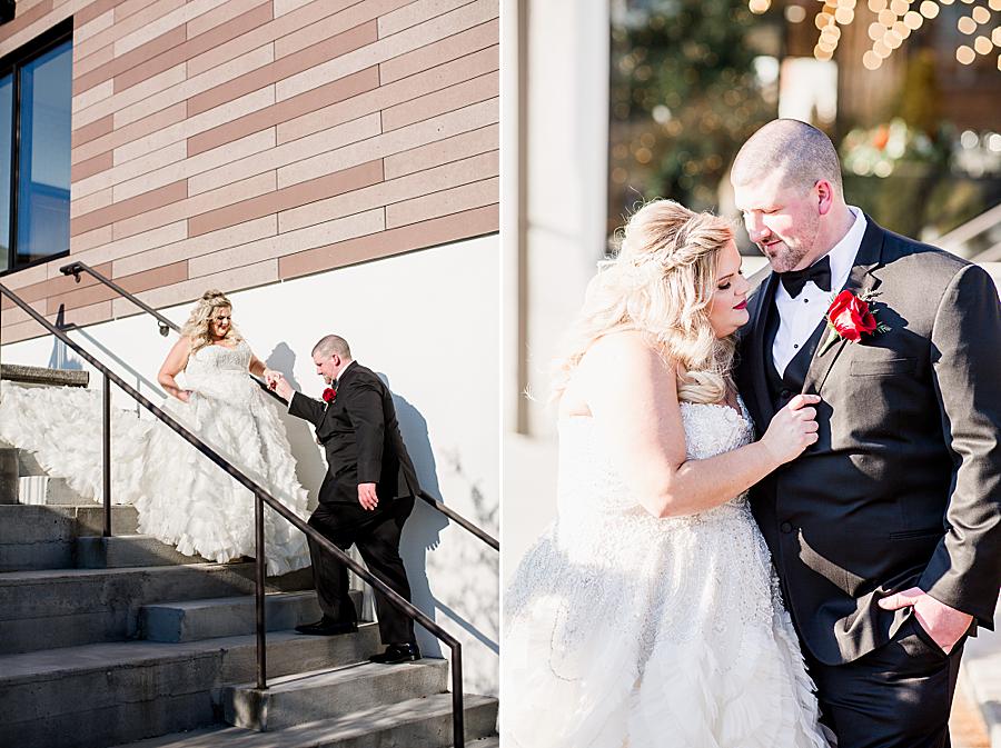 Walking down the stairs at this The Press Room Wedding by Knoxville Wedding Photographer, Amanda May Photos.