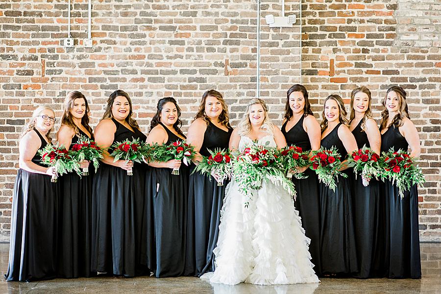 Black bridesmaid dresses at this The Press Room Wedding by Knoxville Wedding Photographer, Amanda May Photos.