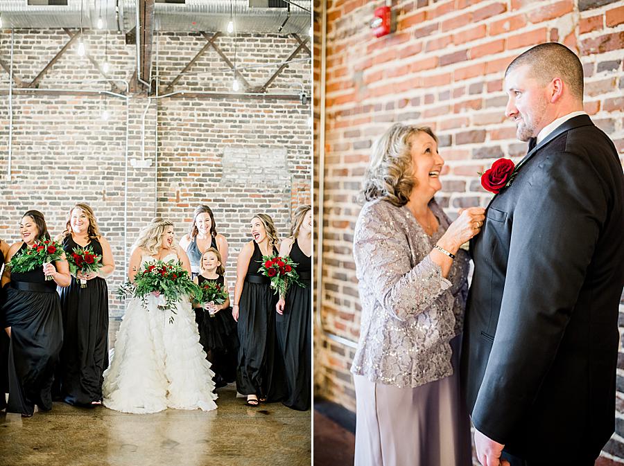 Mom buttoning son's jacket at this The Press Room Wedding by Knoxville Wedding Photographer, Amanda May Photos.