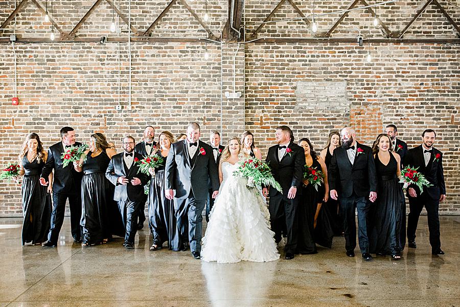 Bridal party walking at this The Press Room Wedding by Knoxville Wedding Photographer, Amanda May Photos.