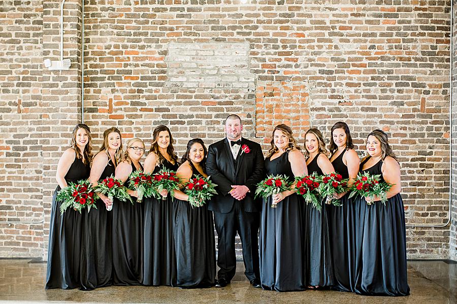 Groom and bridesmaids at this The Press Room Wedding by Knoxville Wedding Photographer, Amanda May Photos.