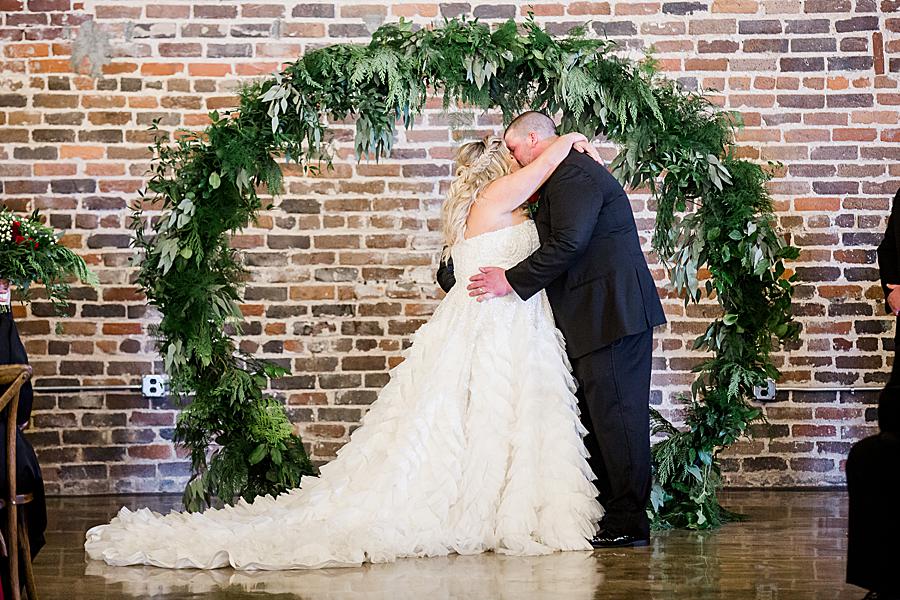 You may kiss the bride at this The Press Room Wedding by Knoxville Wedding Photographer, Amanda May Photos.