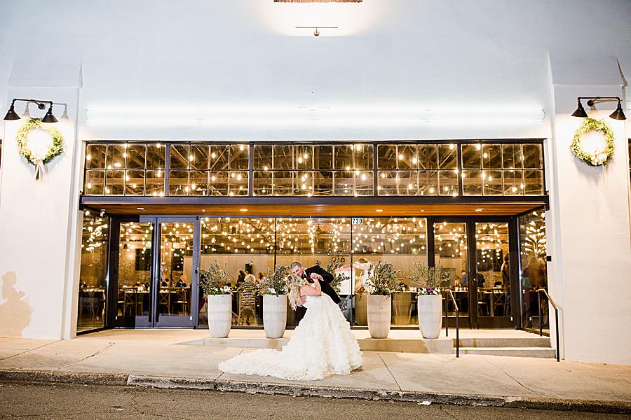Dip kiss at this The Press Room Wedding by Knoxville Wedding Photographer, Amanda May Photos.