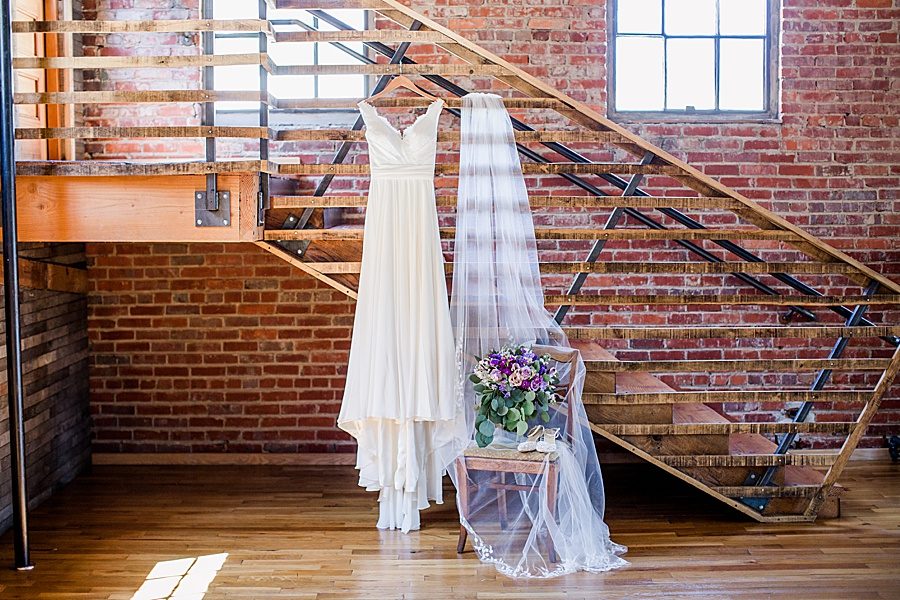 Industrial staircase and brick wall at this Wedding at The Standard by Knoxville Wedding Photographer, Amanda May Photos.