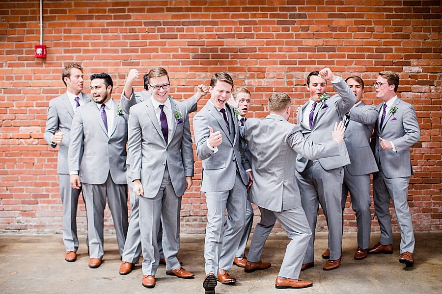 Groomsmen celebrating at this Wedding at The Standard by Knoxville Wedding Photographer, Amanda May Photos.