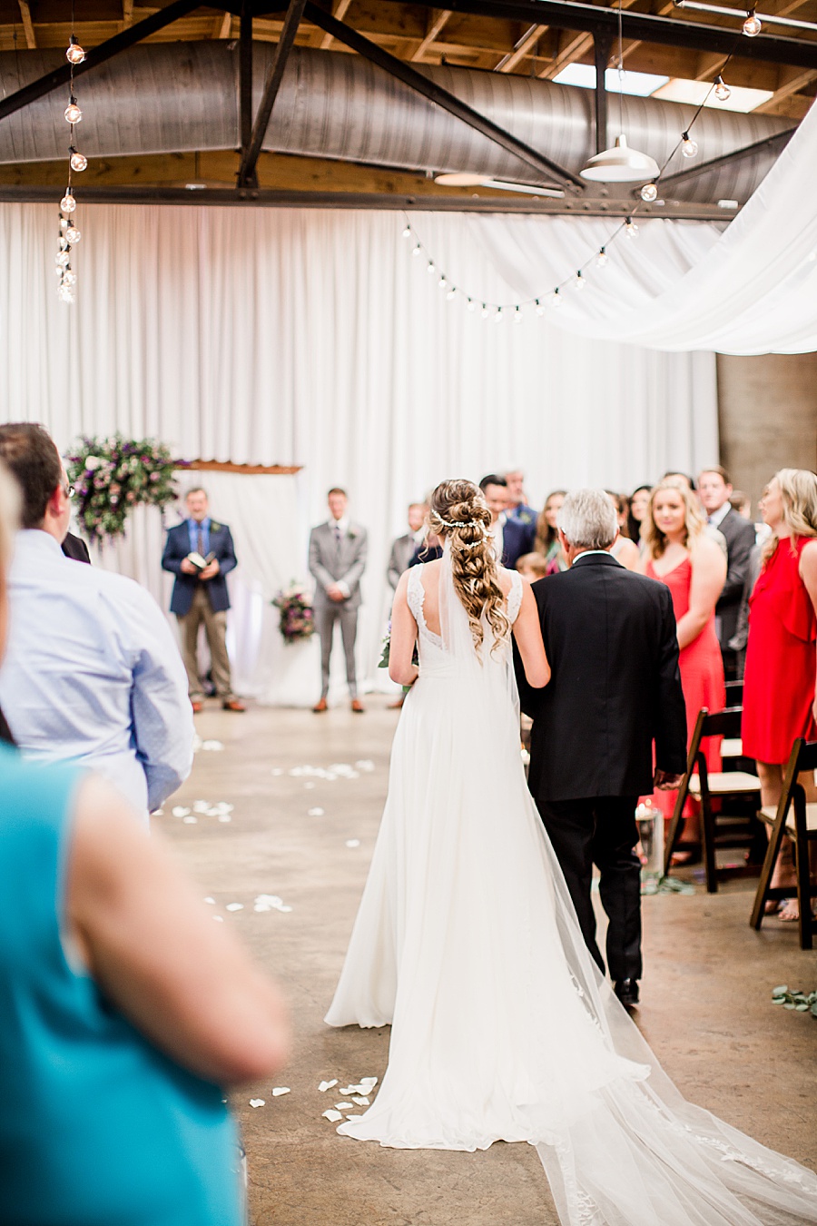 Walking down the aisle at this Wedding at The Standard by Knoxville Wedding Photographer, Amanda May Photos.