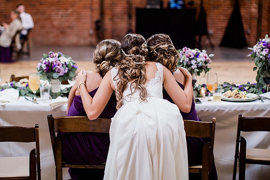 Bride hugging guests by Knoxville Photographer, Amanda May Photos.