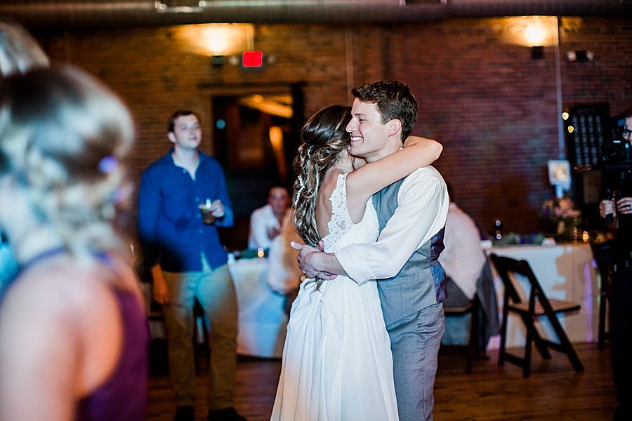 Bride hugging groom by Knoxville Photographer, Amanda May Photos.