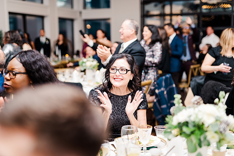 guest clapping at reception
