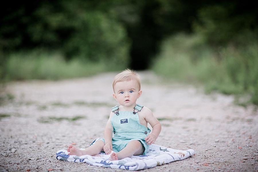 Dinosaur blanket at this Meads Quarry 9 month photos session by Knoxville Wedding Photographer, Amanda May Photos.